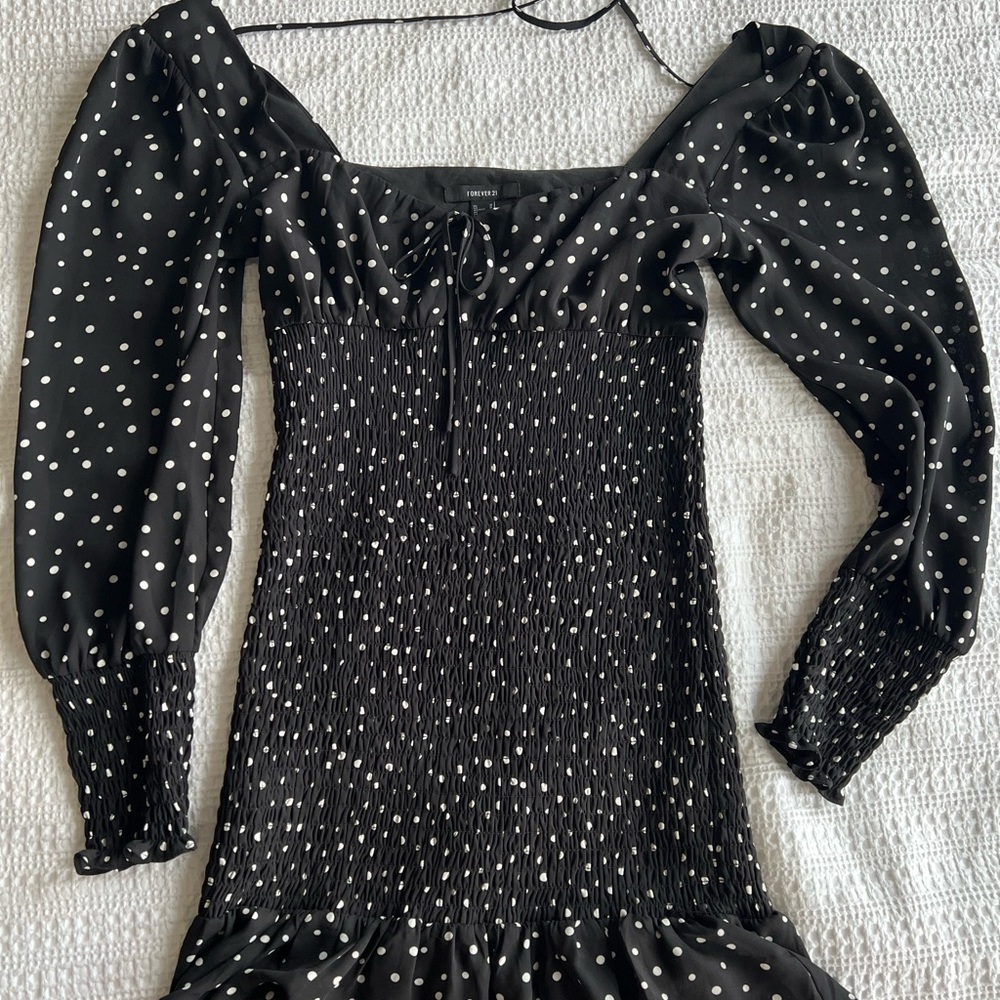 Black dress with white polka dots